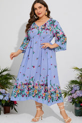 Robe mi-longue fleurie grande taille à col en V et manches trois-quarts
